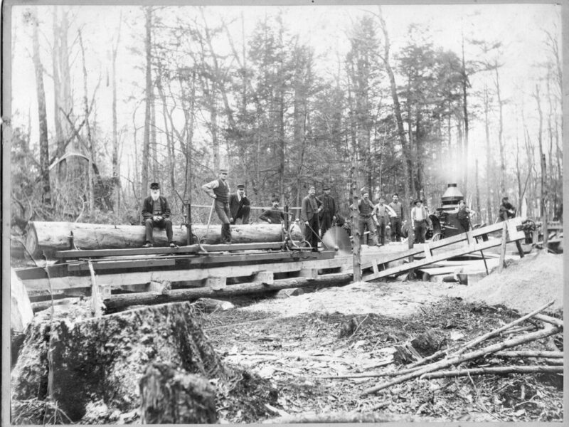 Logging crew cutting lumber steam engine power in Colborne Township, c 1895 From left Joe Goldthorpe, Albert Goldthorpe and Peter J MacEwan